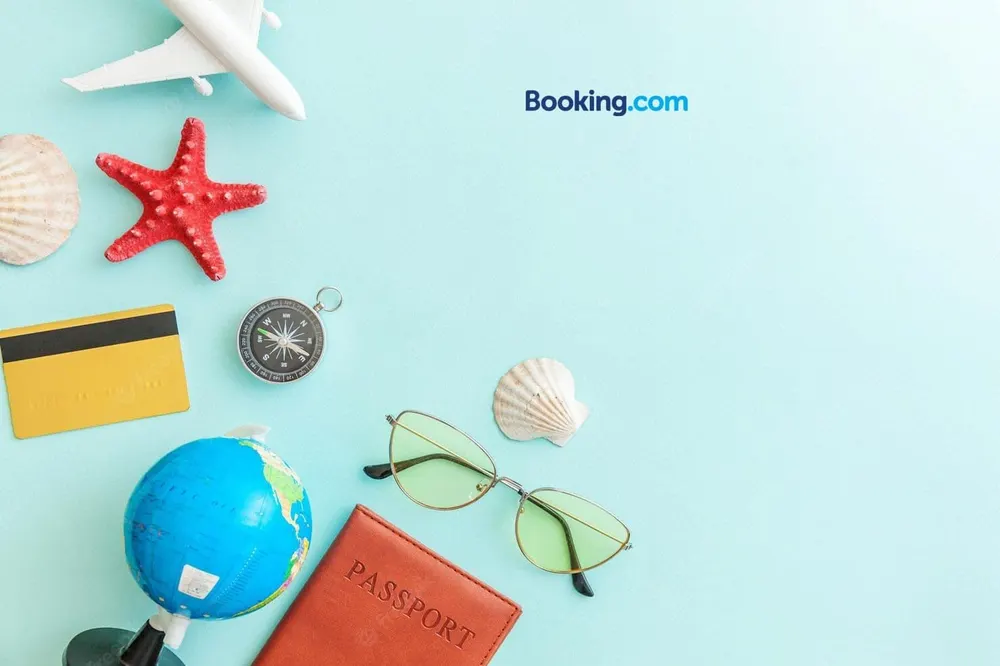 Booking.com travel graphic with a globe and model plane