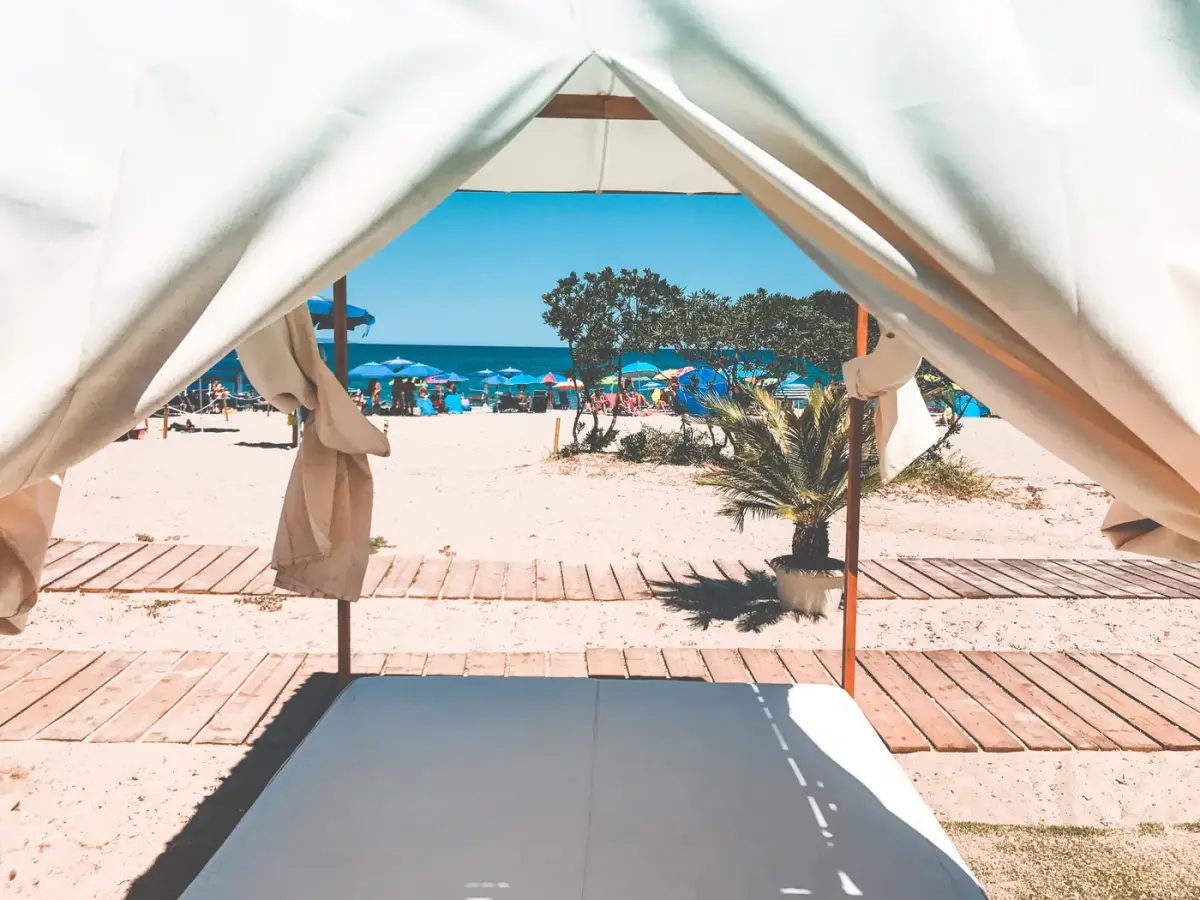 Curtained beach canopy overlooking the sea