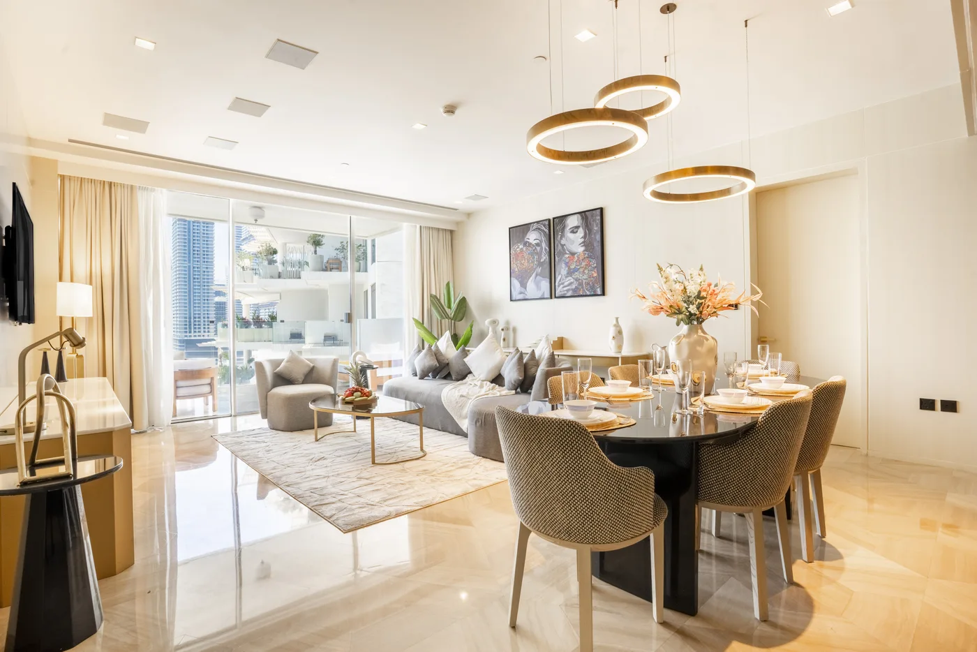 Living and dining area of the Astonishing two-bedroom apartment at FIVE Palm
