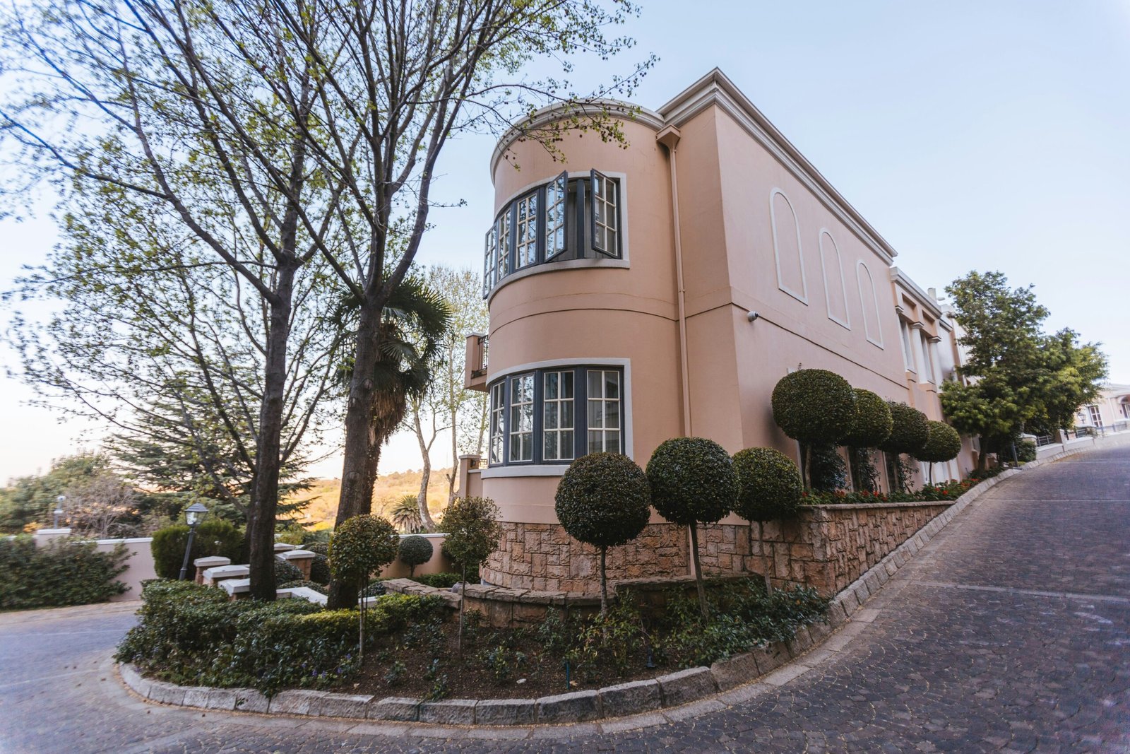 a house with a brick driveway